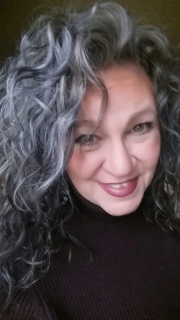 hairstyles for over 50 with glasses