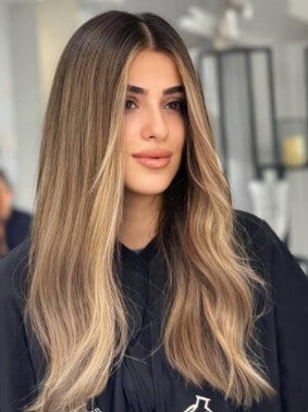 warm brown hair with blonde highlights