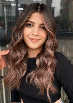 blonde highlights on brown hair with curtain bangs