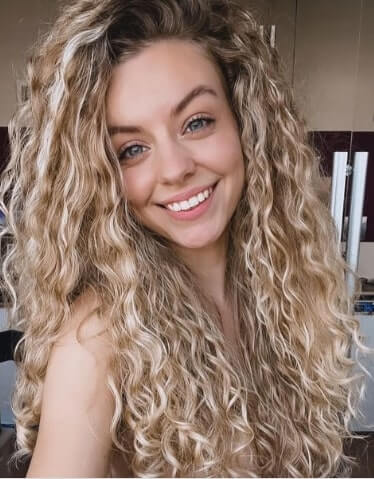 Loose Curls Of Blonde And Red