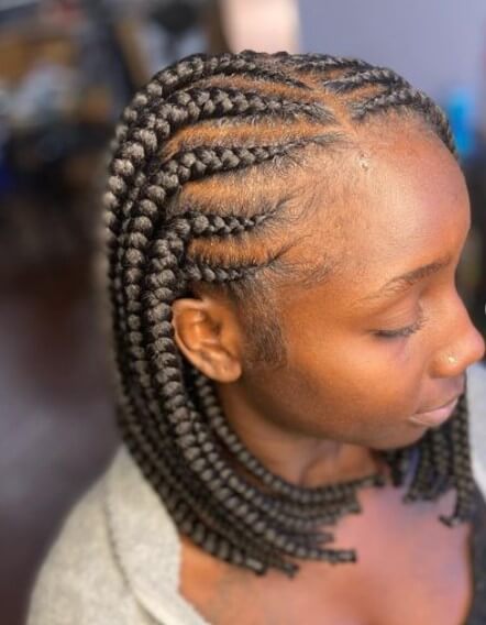Sleek Knotless Braids With a Side Part